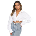 Long sleeved, short, loose fitting solid color cardigan with tie up collar and single breasted urban casual fashion shirt