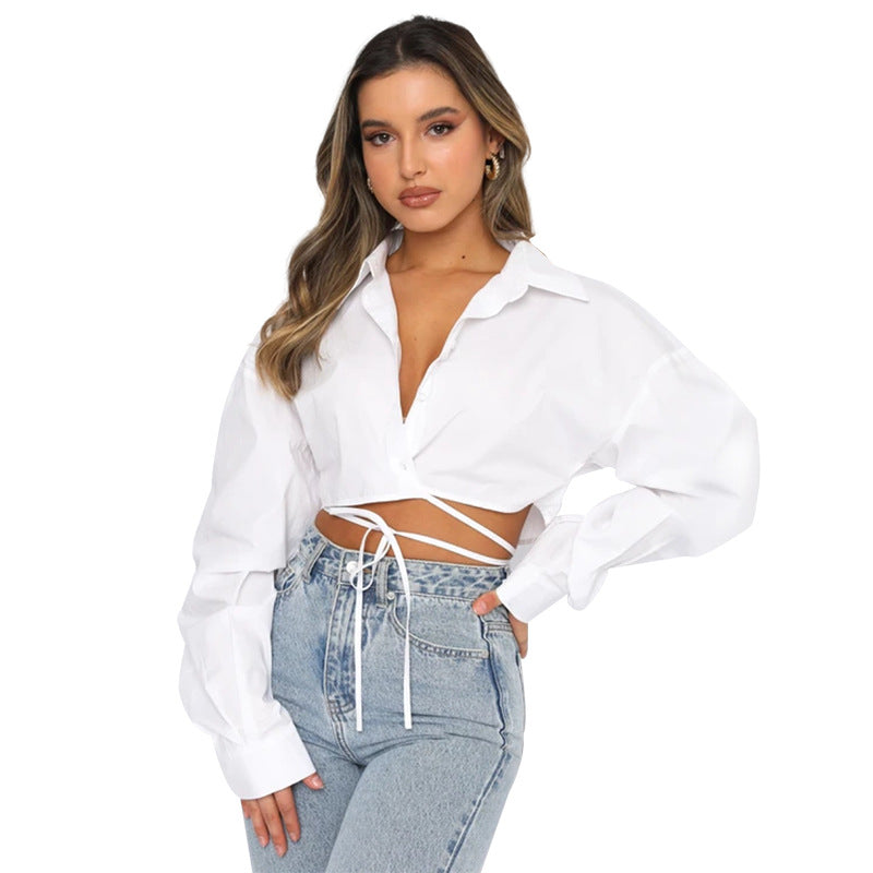 Long sleeved, short, loose fitting solid color cardigan with tie up collar and single breasted urban casual fashion shirt