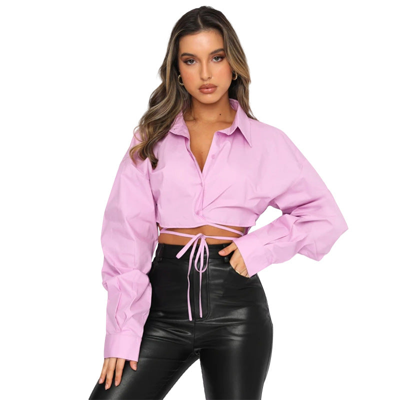 Long sleeved, short, loose fitting solid color cardigan with tie up collar and single breasted urban casual fashion shirt