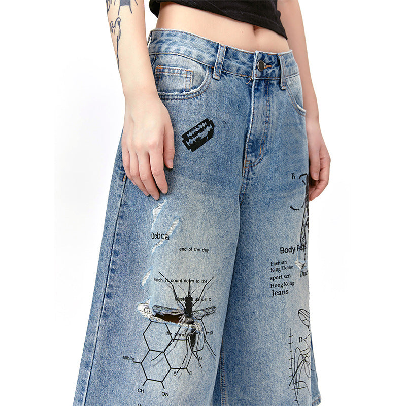 Street Graffiti Print Destroyed Hole Seven-Quarter Denim Shorts for Men