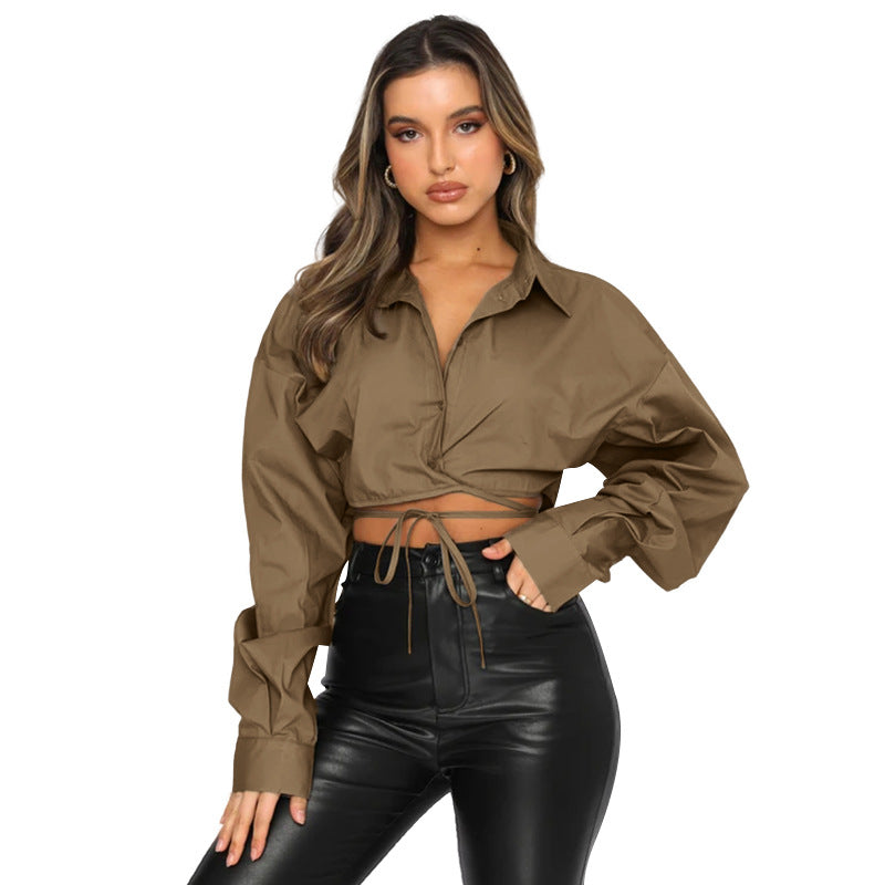 Long sleeved, short, loose fitting solid color cardigan with tie up collar and single breasted urban casual fashion shirt